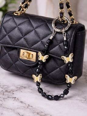 Black Quilted Shoulder Bag with Gold Hardware